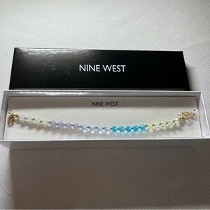 NEW. Nine West Pastel Beaded Bracelet. Gold tone. Adjustable length.Perfect gift